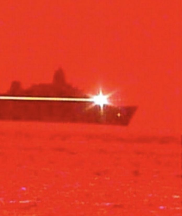 US Navy USS Portland firing laser weapon